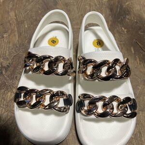 White Sandals with Gold Chain Accents